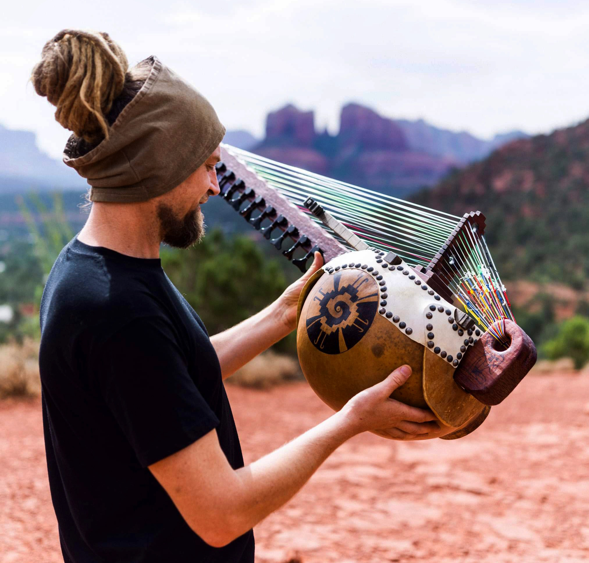 Bryan Anthony Vallone holding Quetzalcoatl Kora